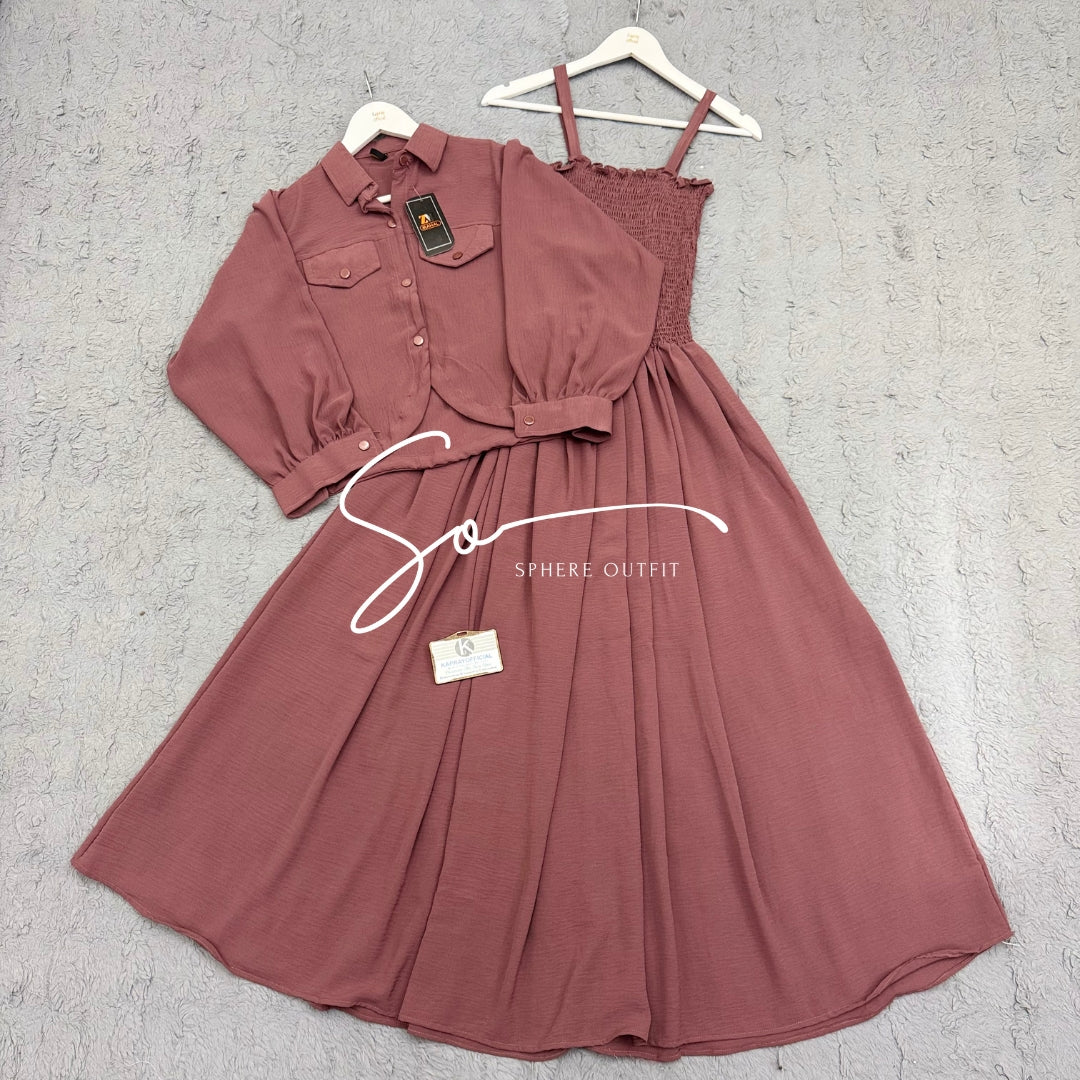 Elegant two-piece beige smocked maxi dress and matching collared jacket set on a hanger