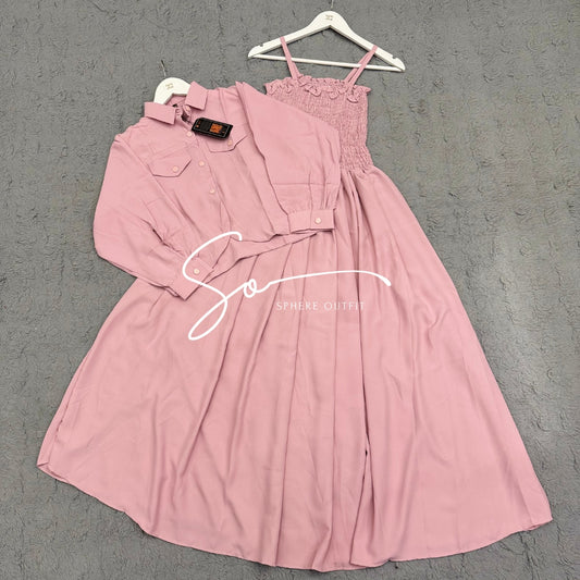 Elegant two-piece beige smocked maxi dress and matching collared jacket set on a hanger