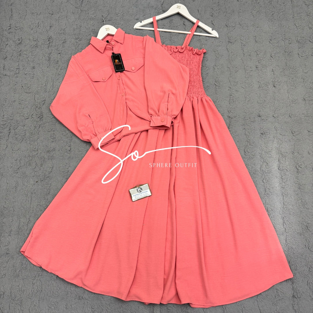 Elegant two-piece beige smocked maxi dress and matching collared jacket set on a hanger