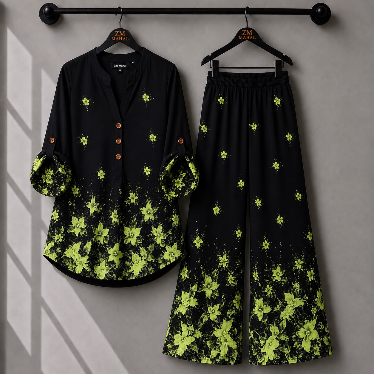 Black co-ord set with vibrant lime floral print and premium relaxed fit trousers.