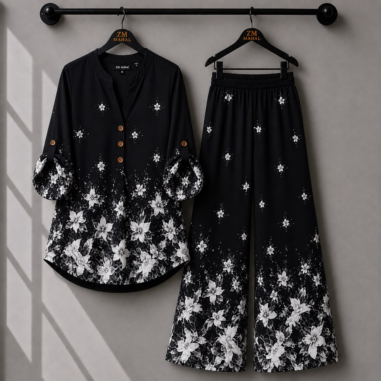 Premium black floral printed women's co-ord set featuring a stylish shirt with wide-leg pants.