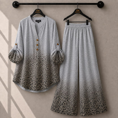 Grey leopard print women's co-ord set with roll-up sleeve shirt and matching wide-leg trousers.